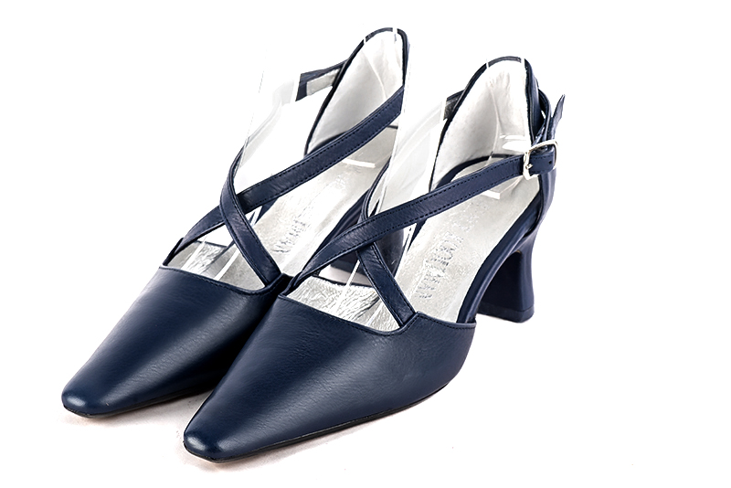 Navy blue women's open side shoes, with crossed straps. Tapered toe. Medium spool heels. Front view - Florence KOOIJMAN